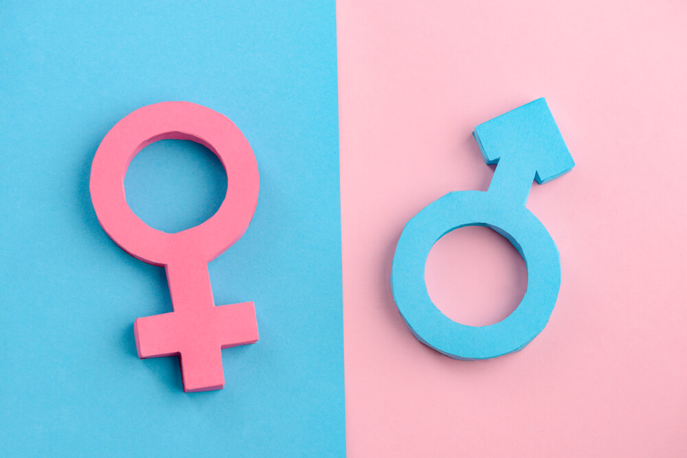 Male and female gender symbols representing hormonal differences in libido for men and women